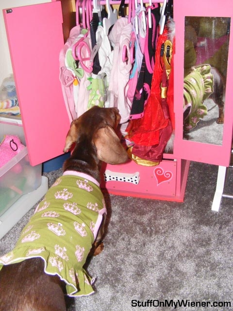 Anya-armoire Anya with her armoire.